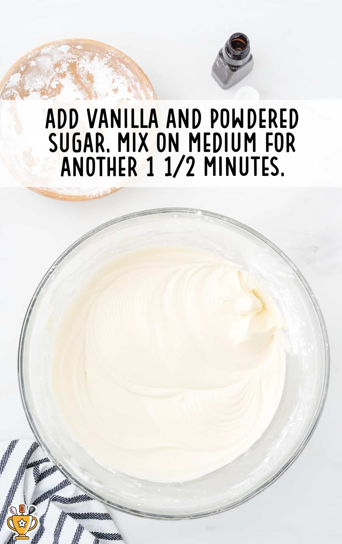 vanilla and powdered sugar added in a bowl