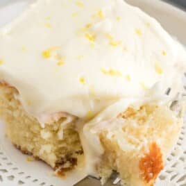 a piece of Lemon Sour Cream Cake on a plate