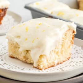 a piece of Lemon Sour Cream Cake on a plate