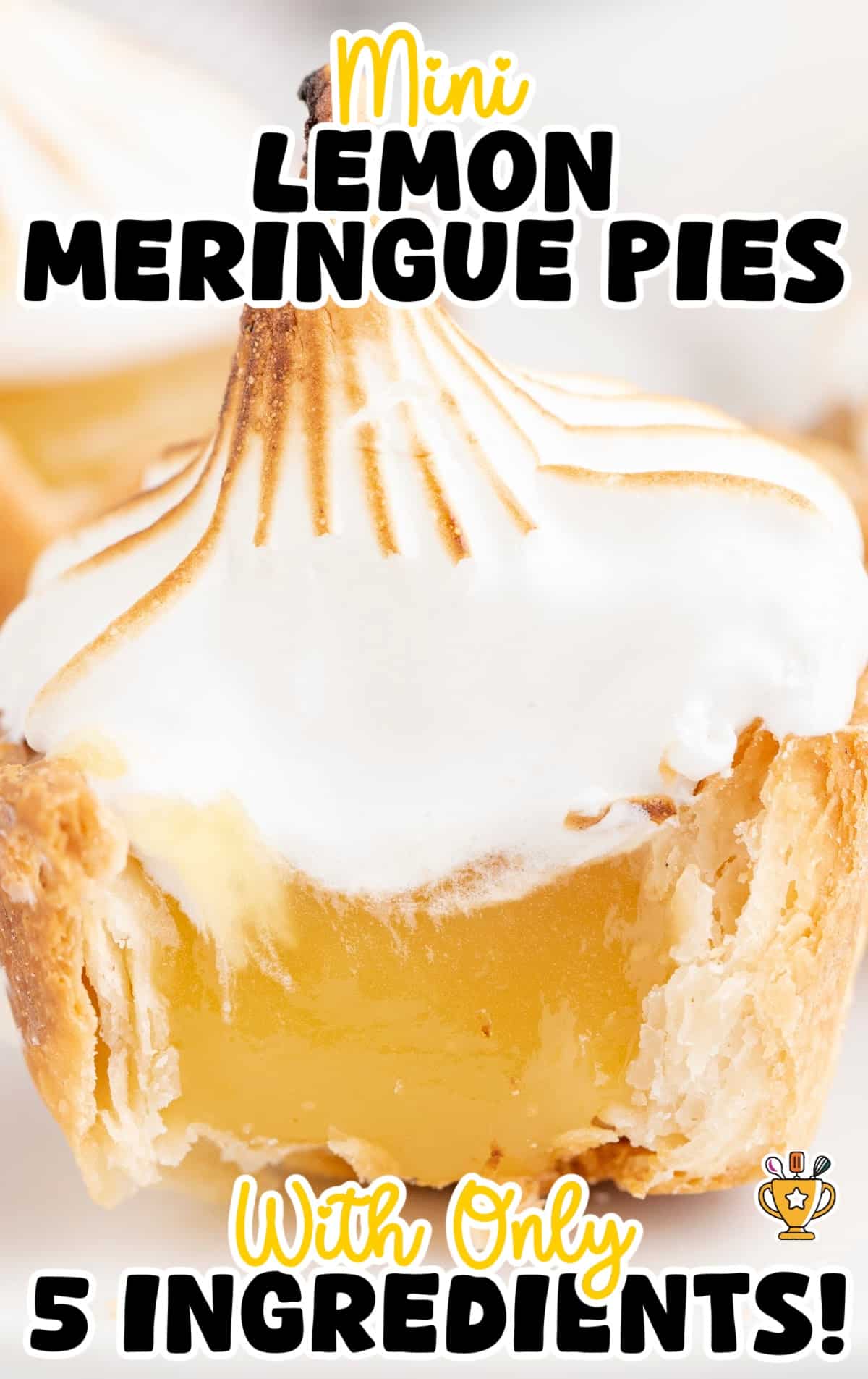 a Mini Lemon Meringue Pie with a bite on it