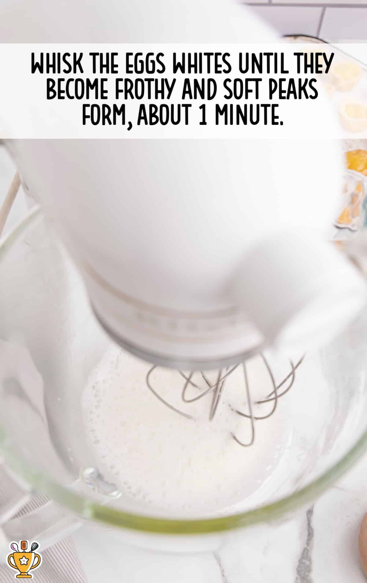 egg whites whisked in a bowl