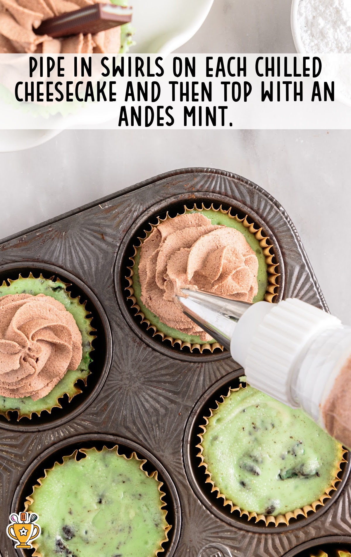 pipping in swirls on cheesecake