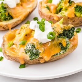 Broccoli and Cheddar Potato Skins on a white plate