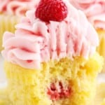 a Raspberry Cupcake with a bite on it