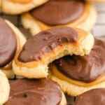 a bunch of Twix Cookies, one with a bite on it