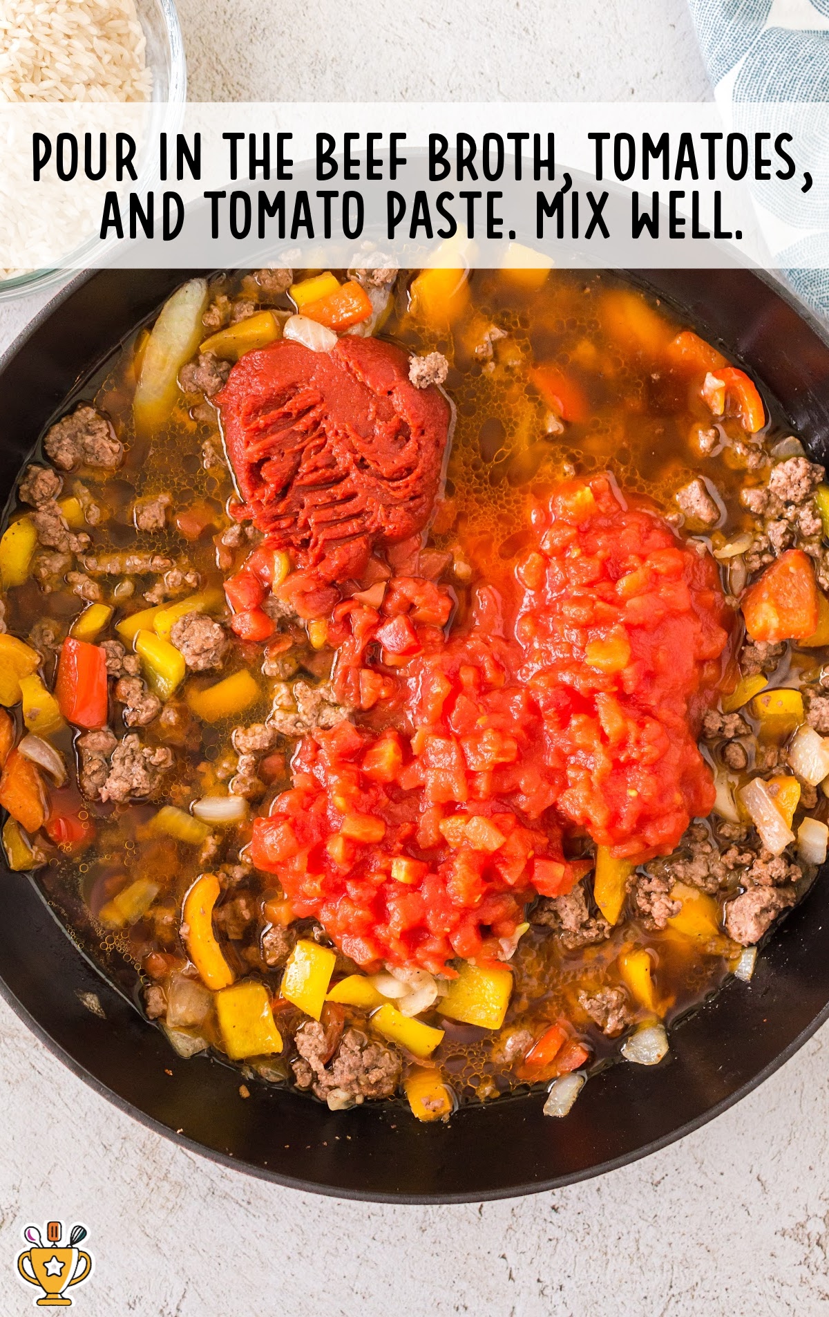 beef broth, tomato and tomato paste added in the skillet