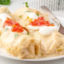 White Chicken Enchiladas on a plate