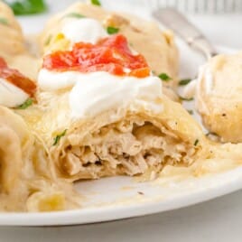 White Chicken Enchiladas on a plate