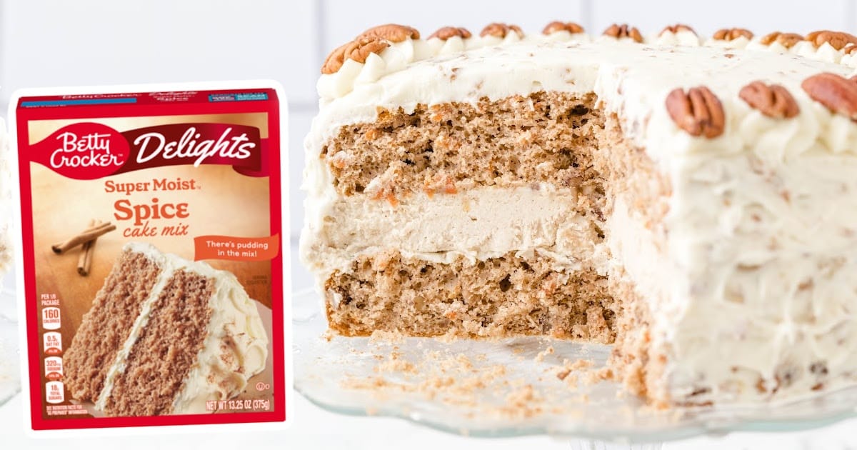 a Carrot Cake Cheesecake with a piece missing