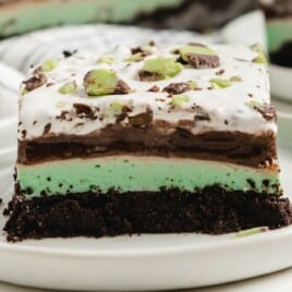 a piece of Chocolate Mint Lasagna on a plate