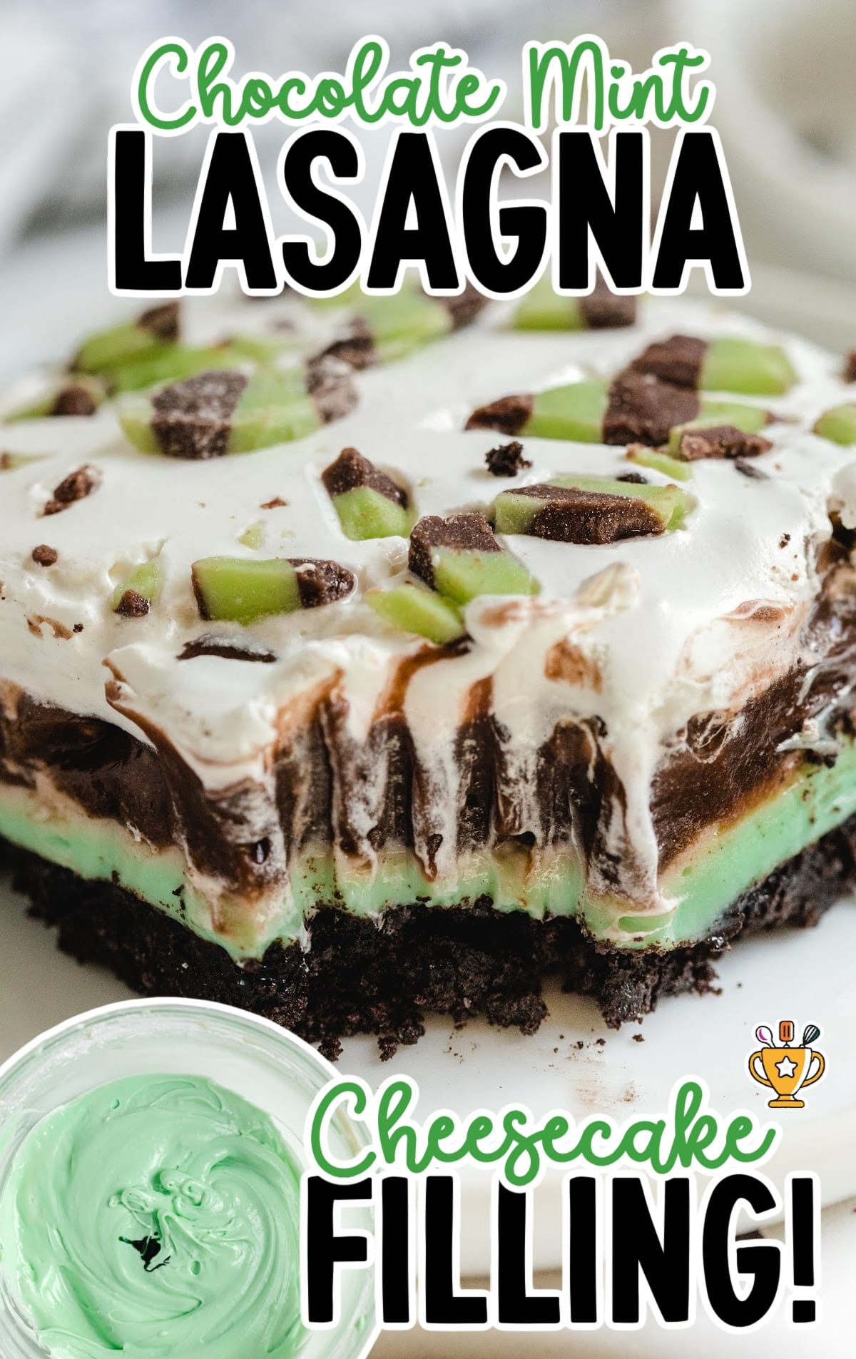 a piece of Chocolate Mint Lasagna with a bite on it