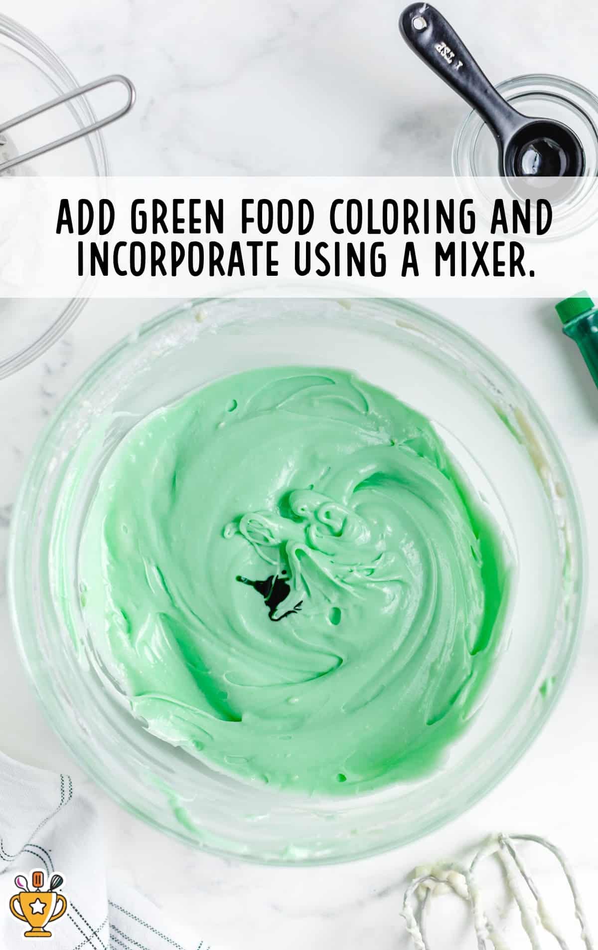 green food coloring added in a bowl