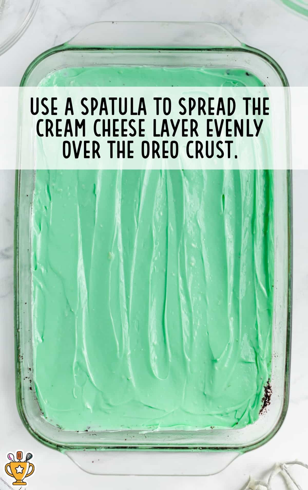cream cheese spread over the oreo crust