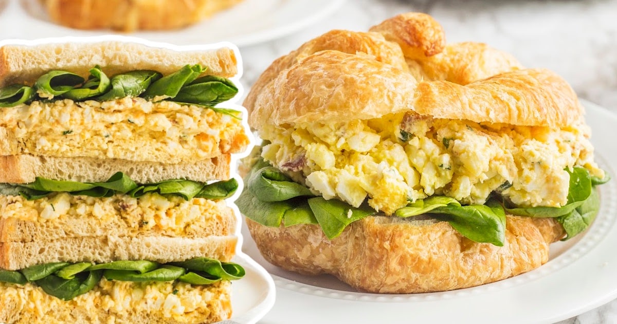 a Egg Salad Sandwich on a plate and a bunch others on the side