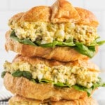 a stack of Egg Salad Sandwiches on a plate