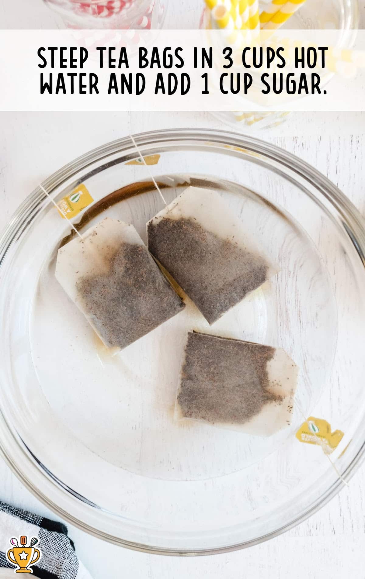 3 tea bags in a hot cup of water