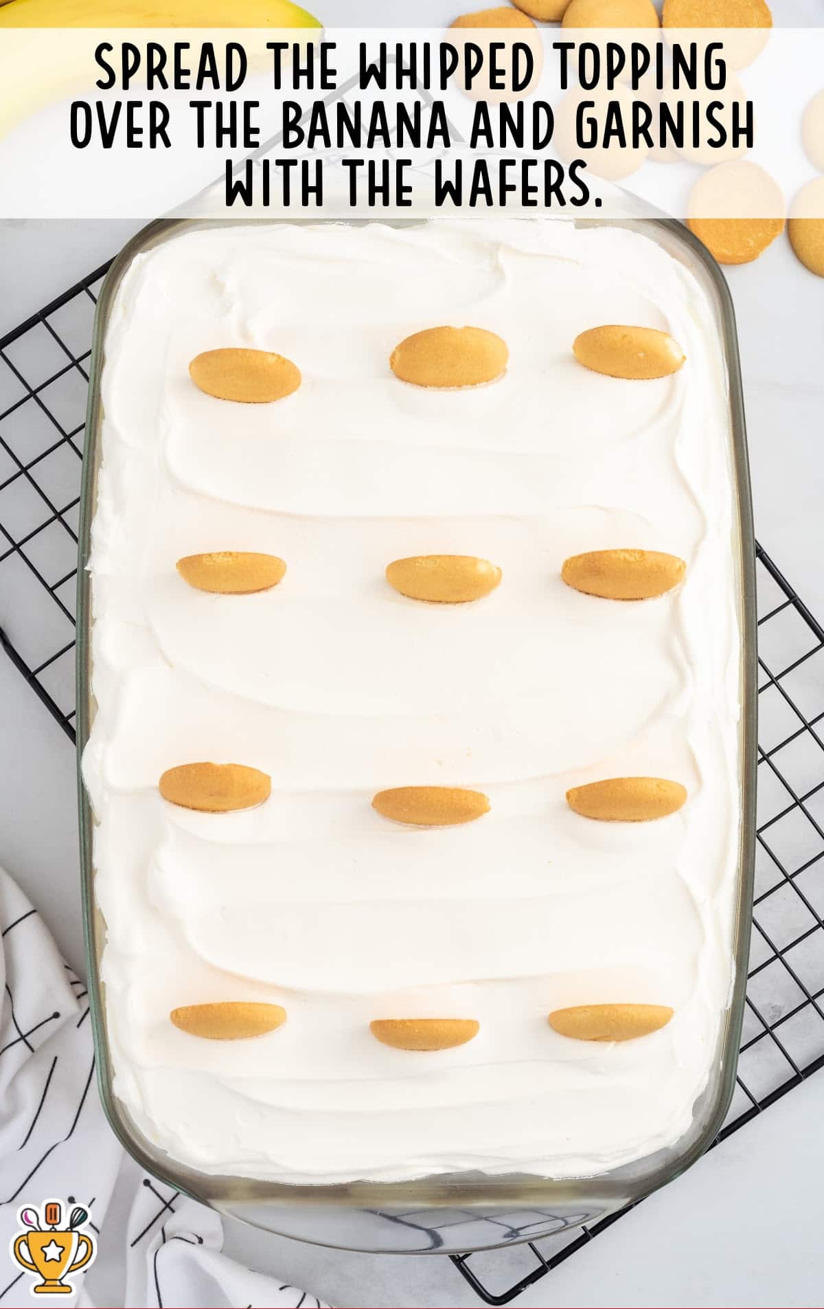 whipped topping spread over the banana and garnished with the wafers