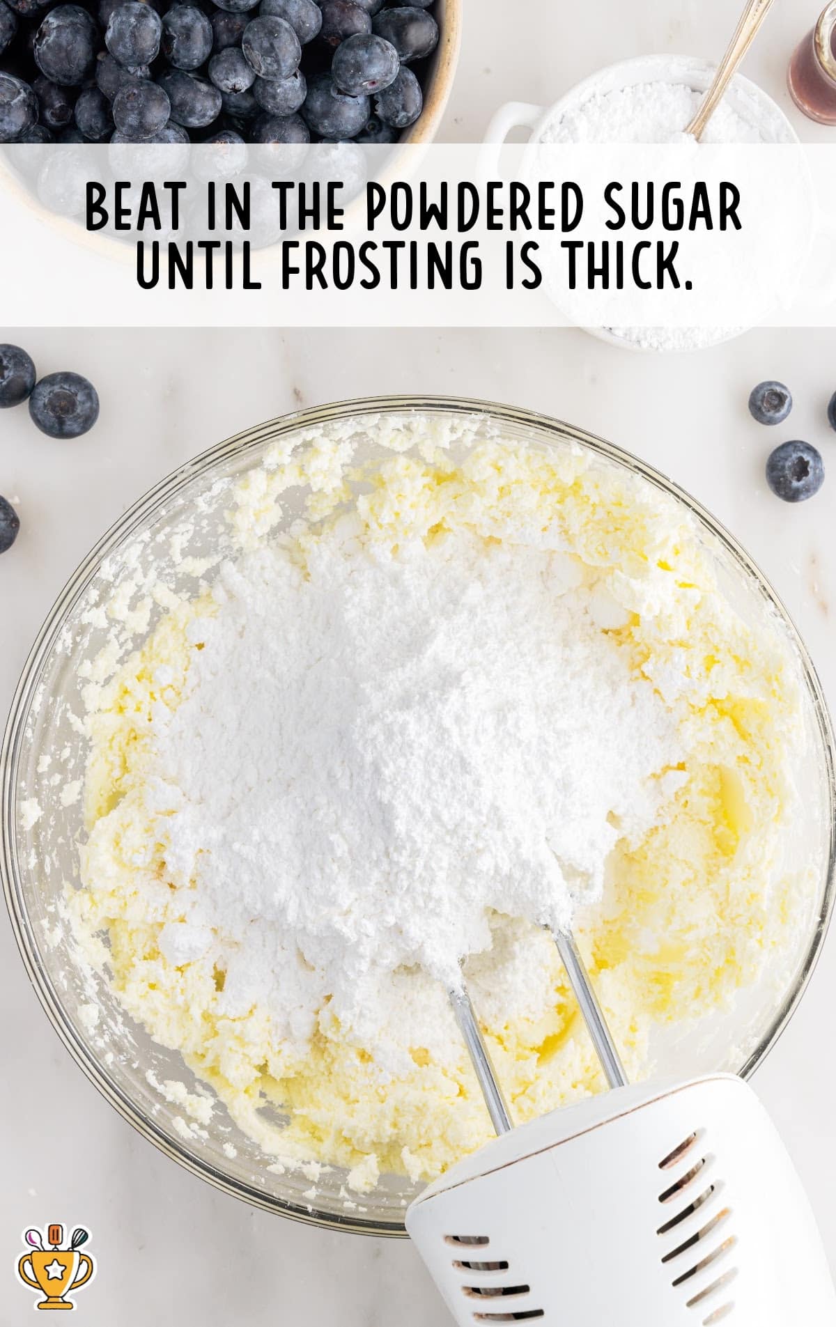 beating the powdered sugar in a bowl