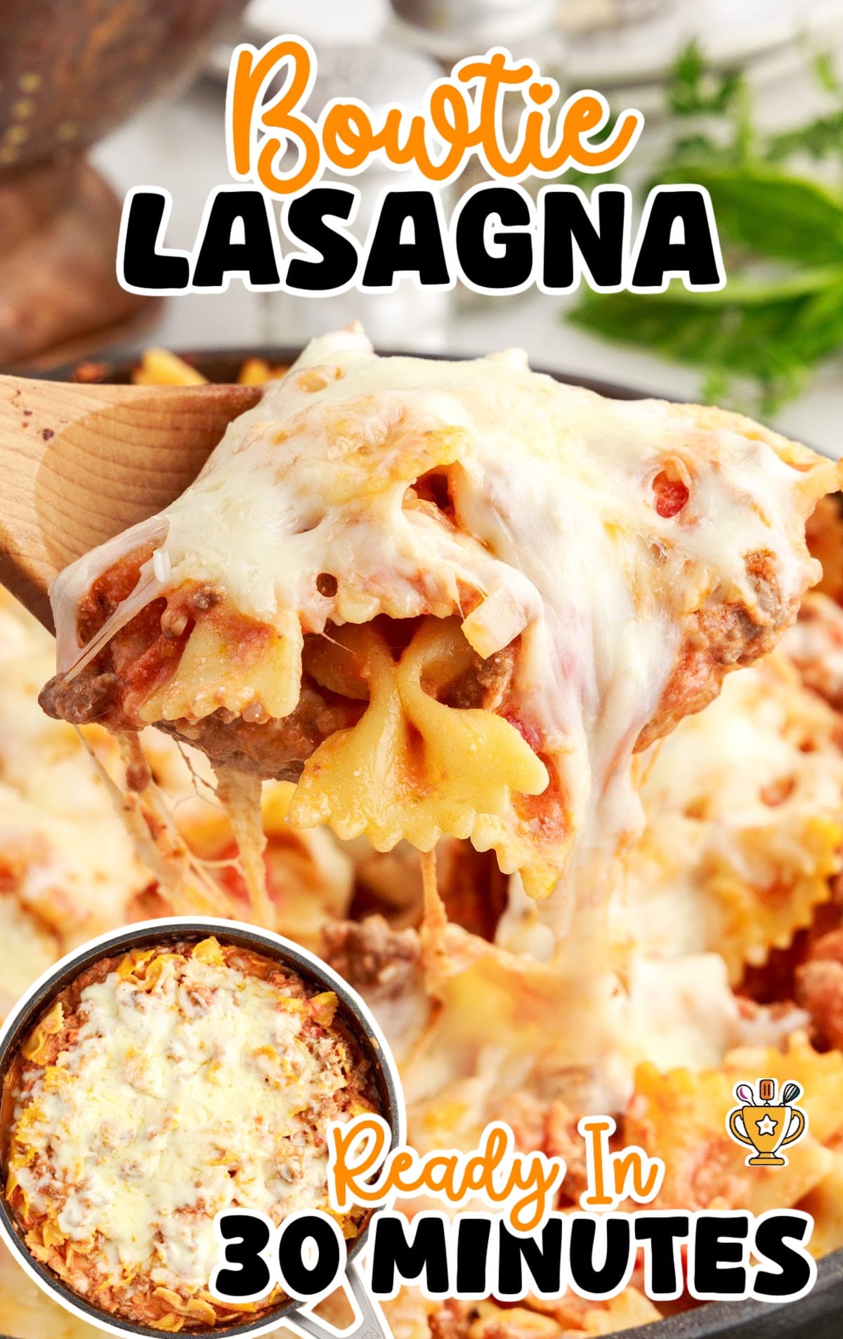 a wooden spoon holding some Bow tie Lasagna