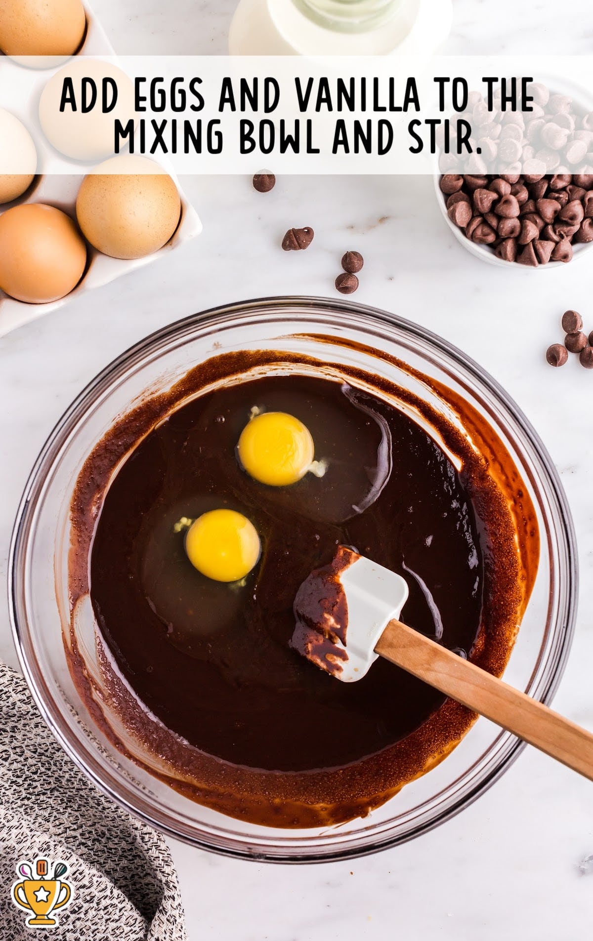 eggs and vanilla added to the mixing bowl