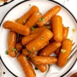 Candied Carrots on a plate with a fork