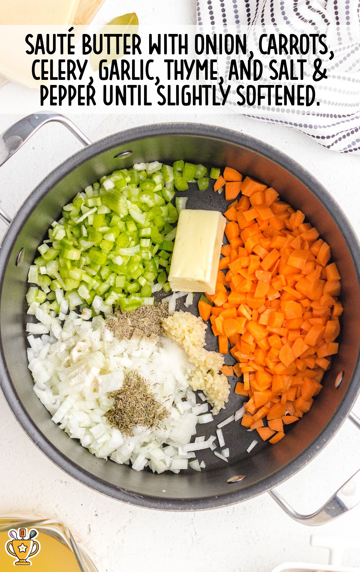 butter with onions, carrots, celery, garlic, thyme and salt and pepper added in a pot