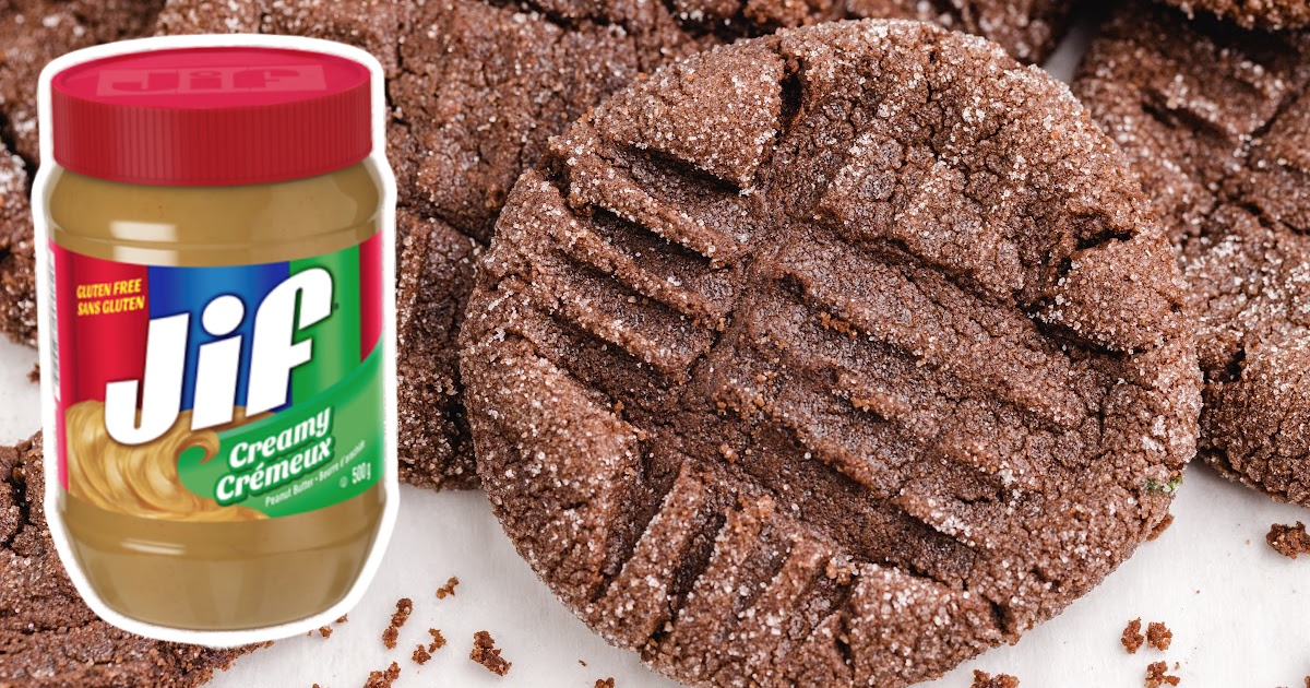 Chocolate Peanut Butter Cookies with a jar of jif peanut butter