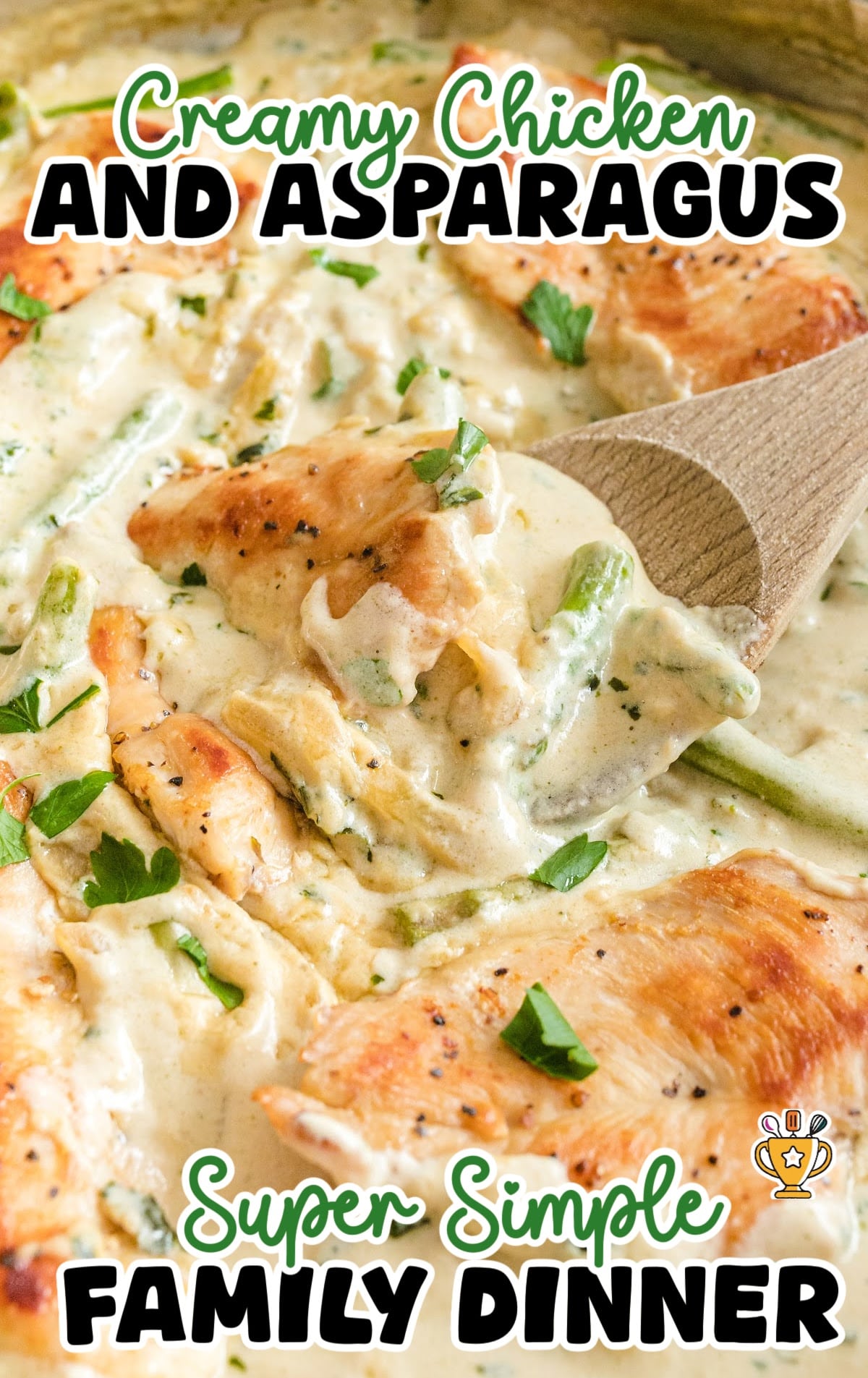 a wooden spoon holding Creamy Chicken and Asparagus