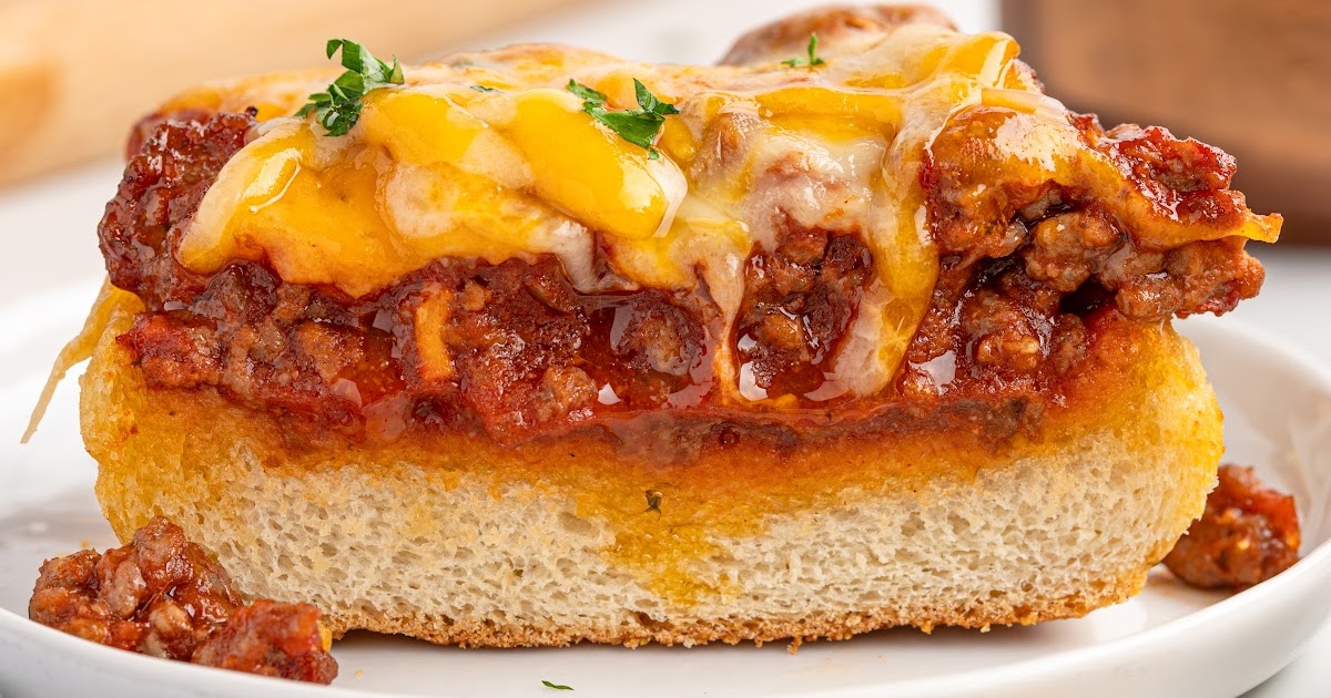 a piece of Sloppy Joe Garlic Bread on a plate