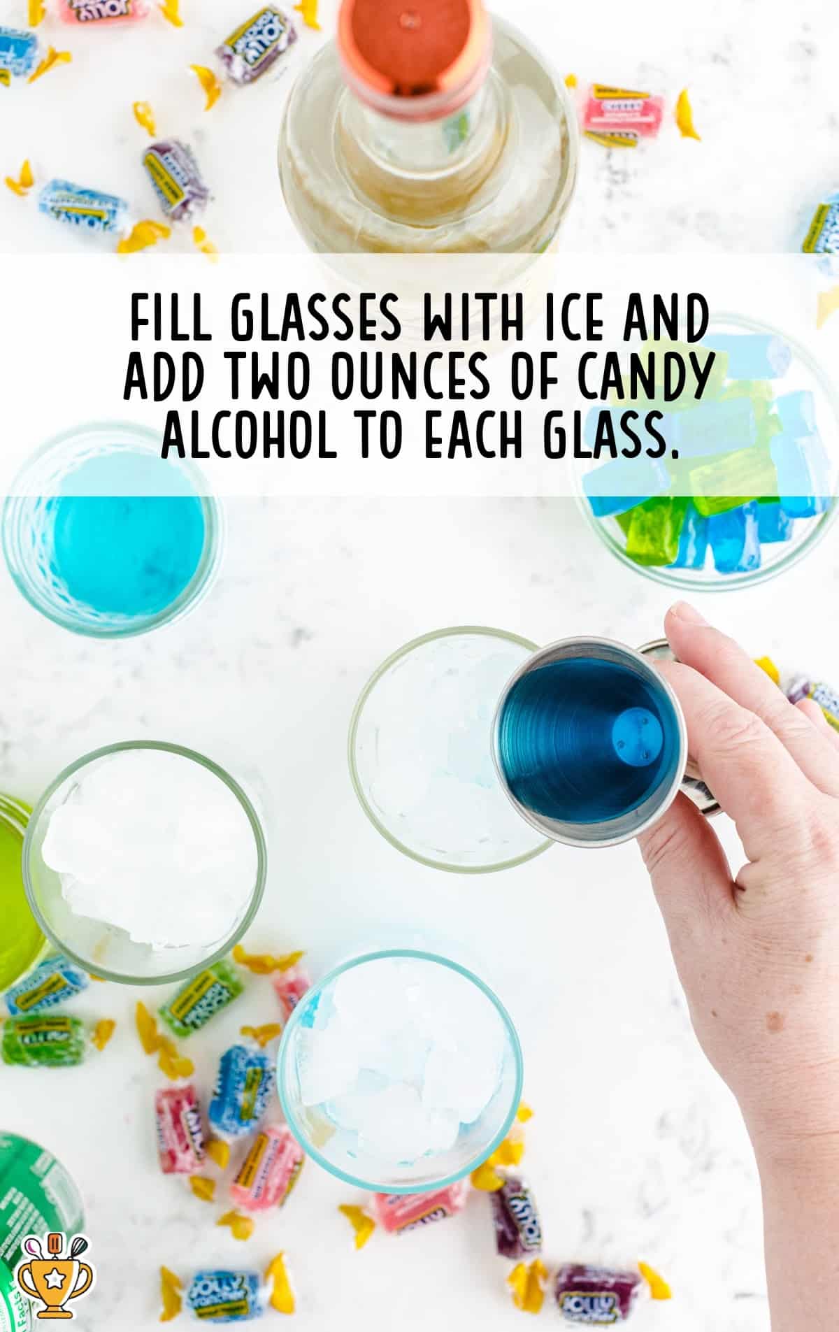 filling glasses with ice and candy alcohol