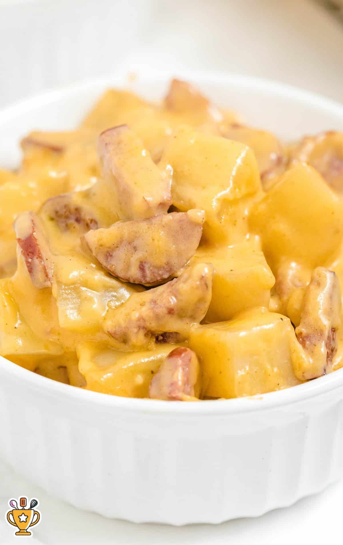Kielbasa and Potato Casserole in a white bowl