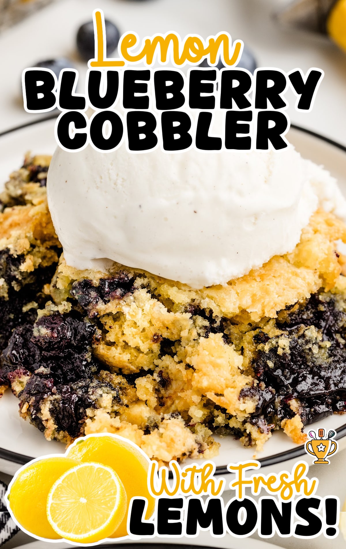 a scoop of lemon blueberry cobbler on a plate with ice cream
