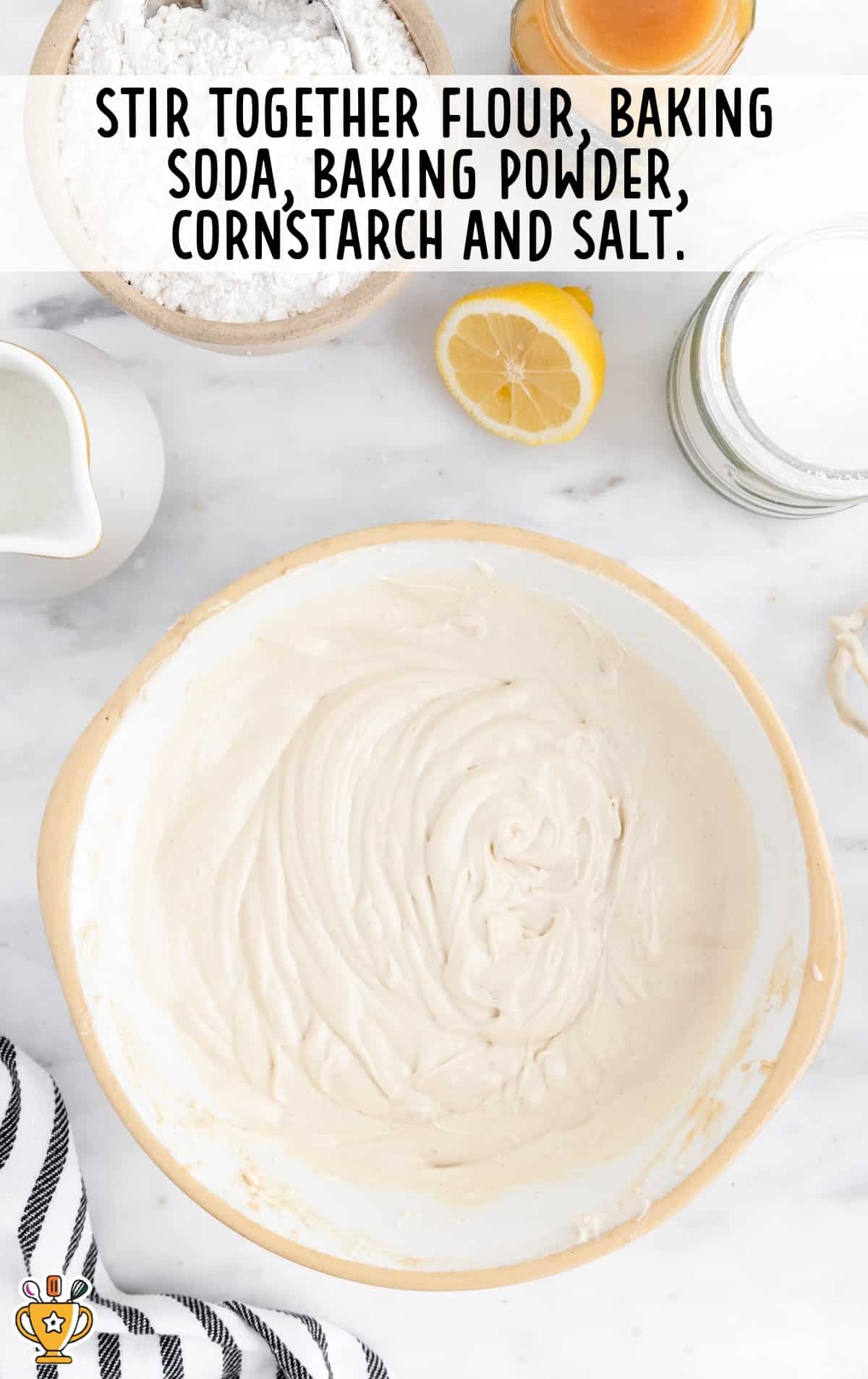 flour, baking soda, baking powder, corn starch and salt stirred together in a bowl