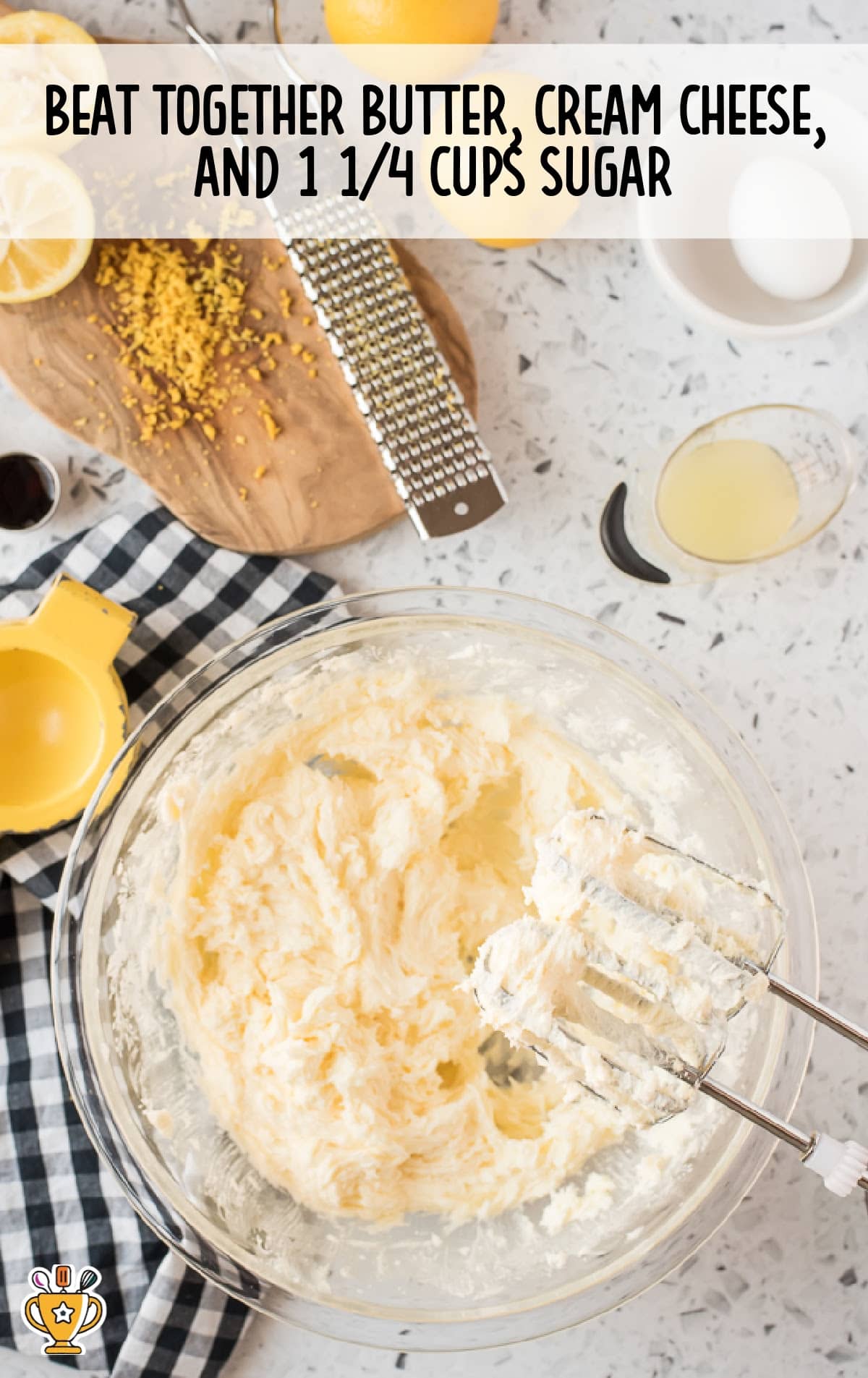 butter, cream cheese and sugar added in the bowl