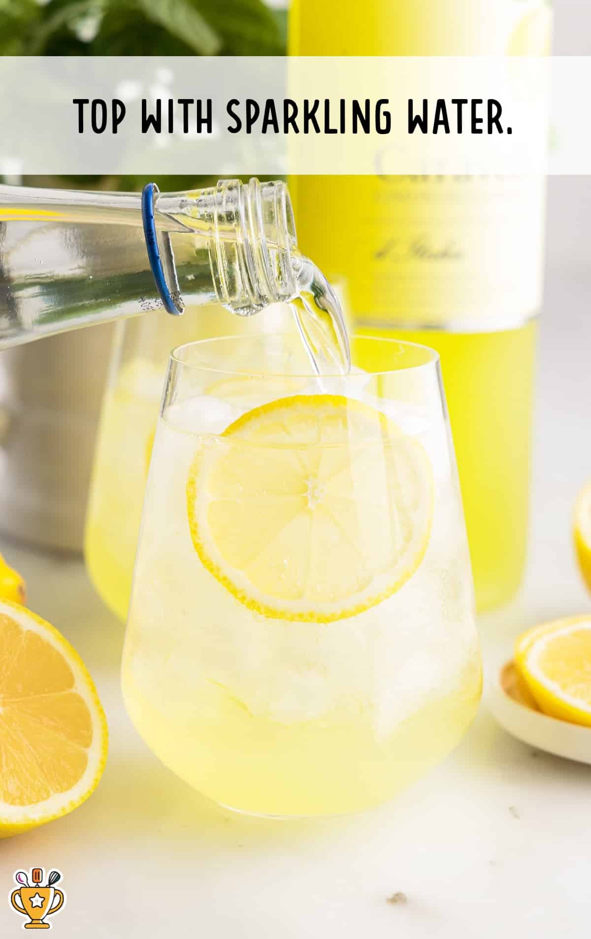pouring Limoncello Spritz in a glass