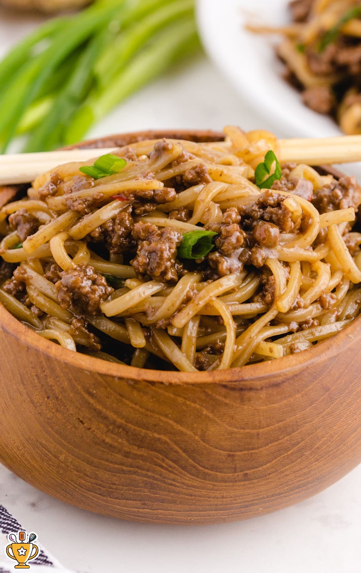 Mongolian Beef and Noodles in a wooden bowl