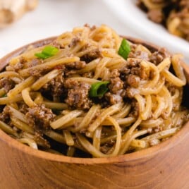 Mongolian Beef and Noodles in a wooden bowl