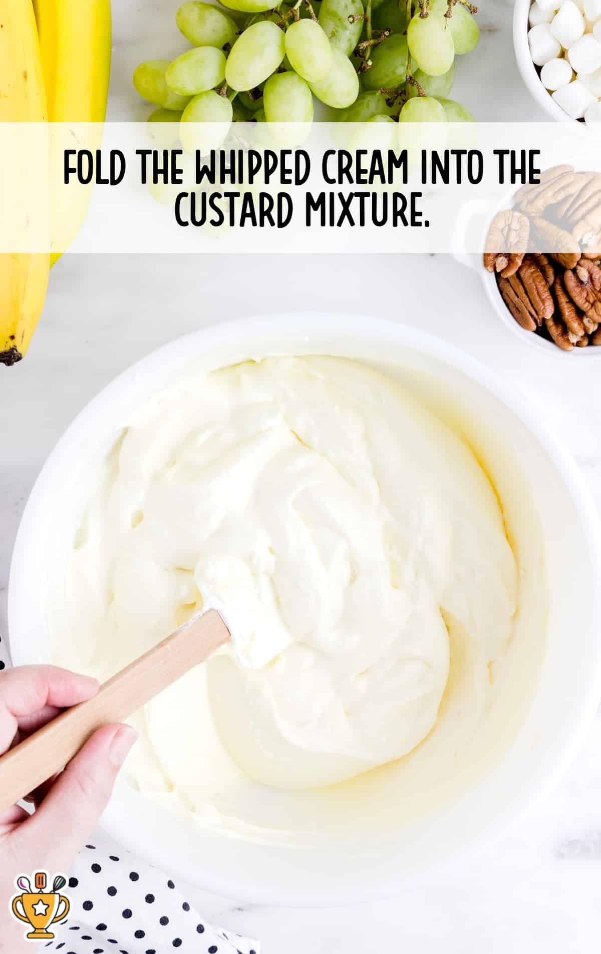 whipped folded in a bowl of custard mixture