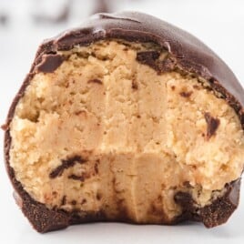 a Peanut Butter Ball with a bite on it