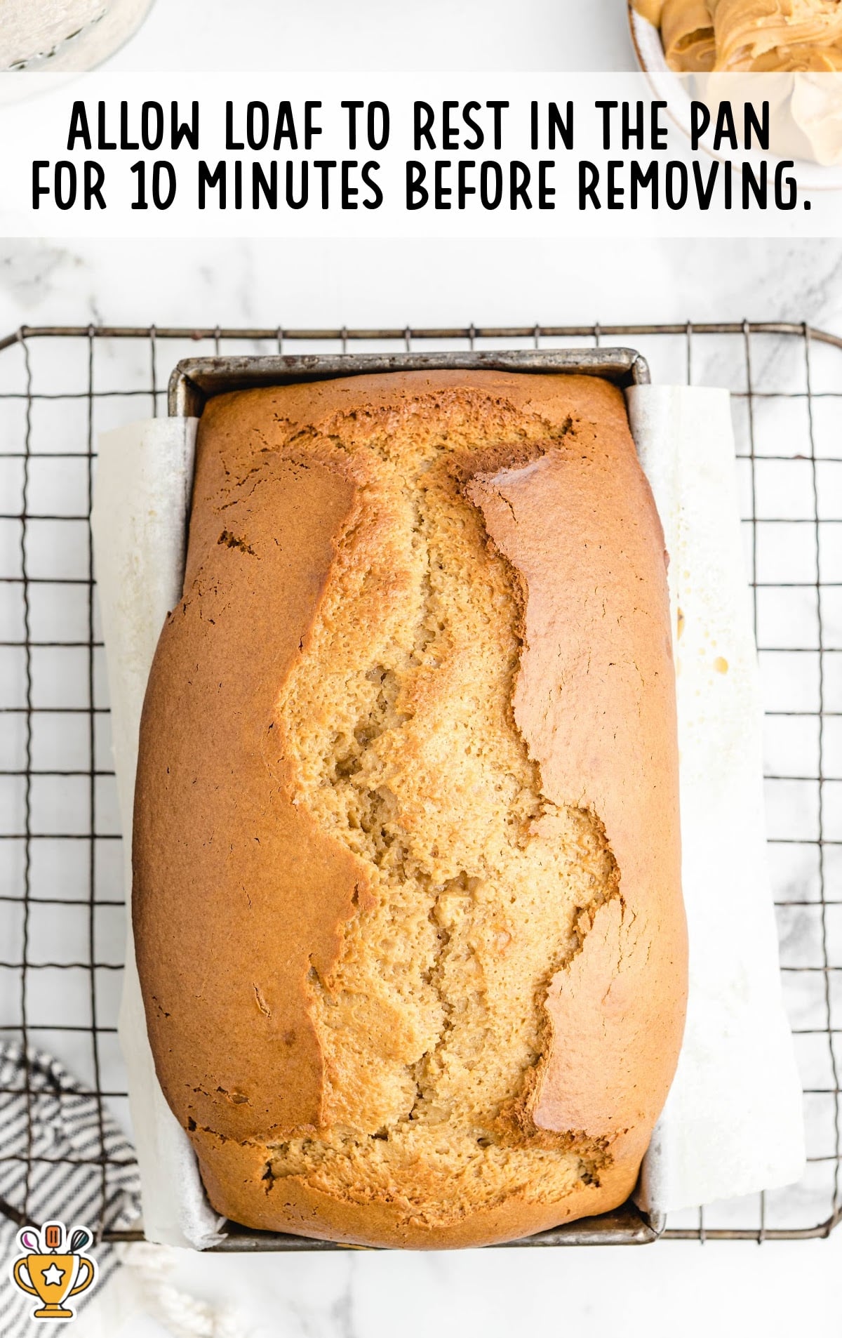a Peanut Butter Quick Bread on a cooling rack