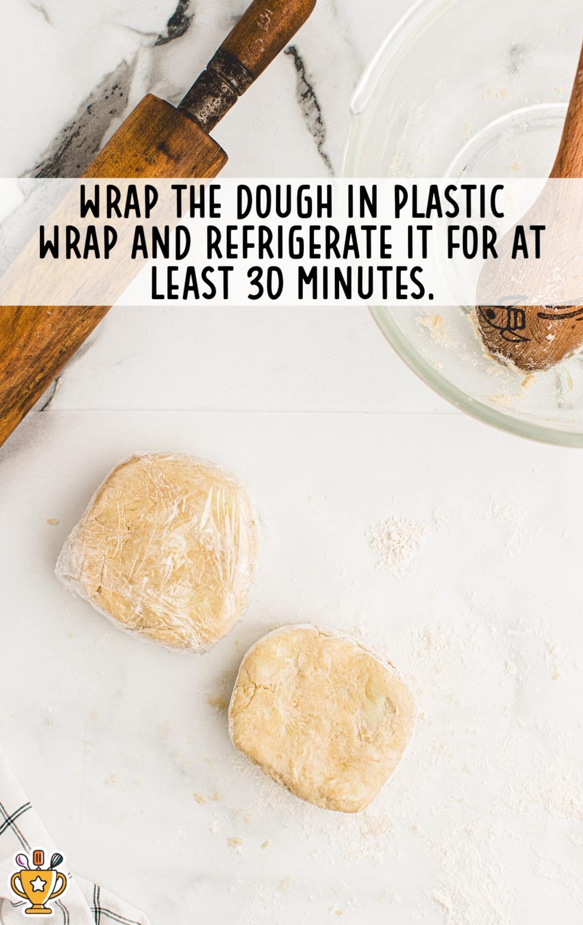 dough wrapped in plastic wrap ready to refregerate