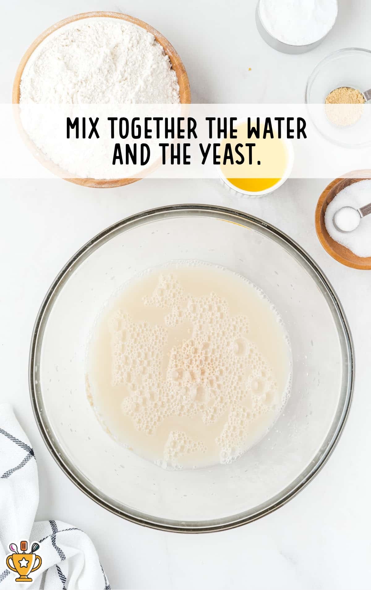 Water and yeast mixed together in a bowl