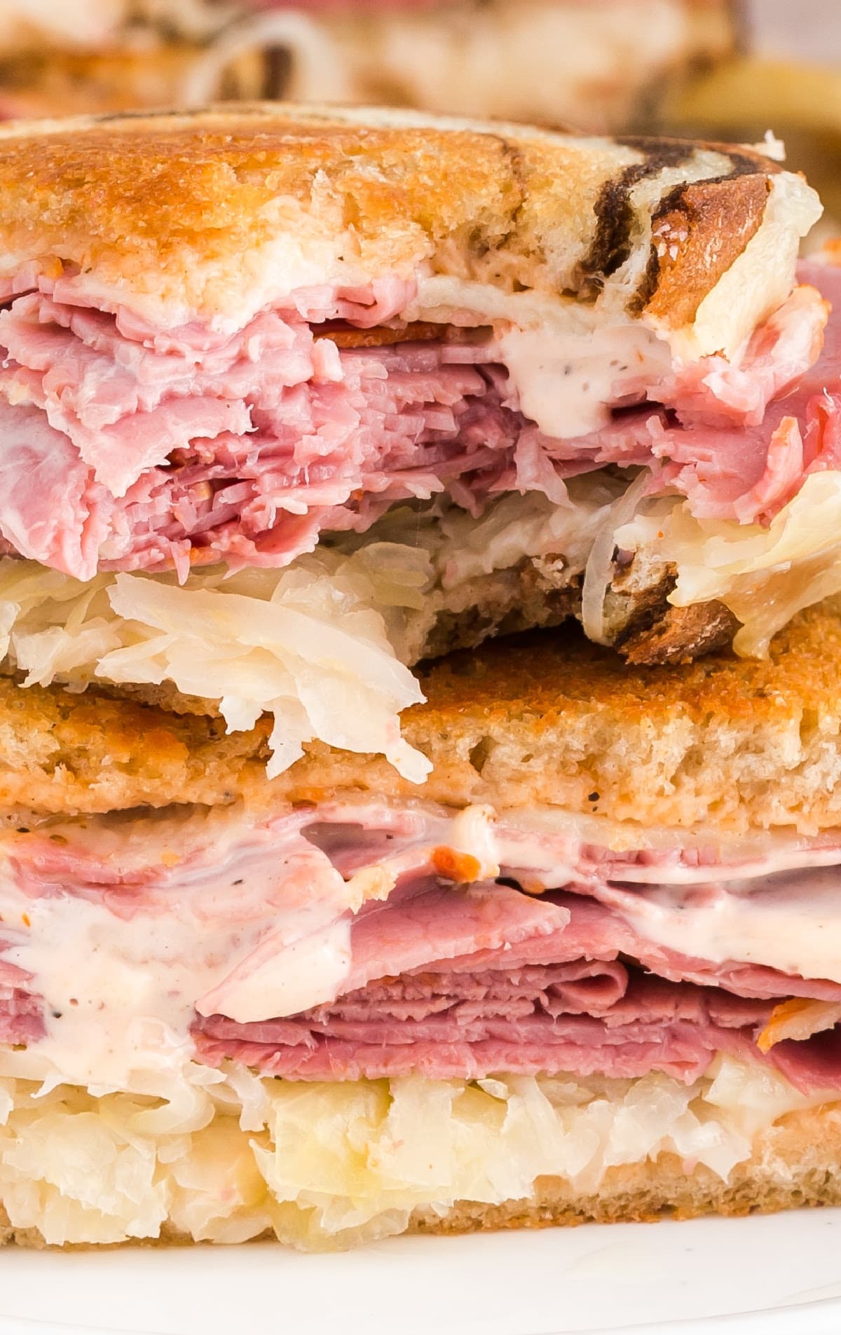 Reuben Sandwich with a bite on it