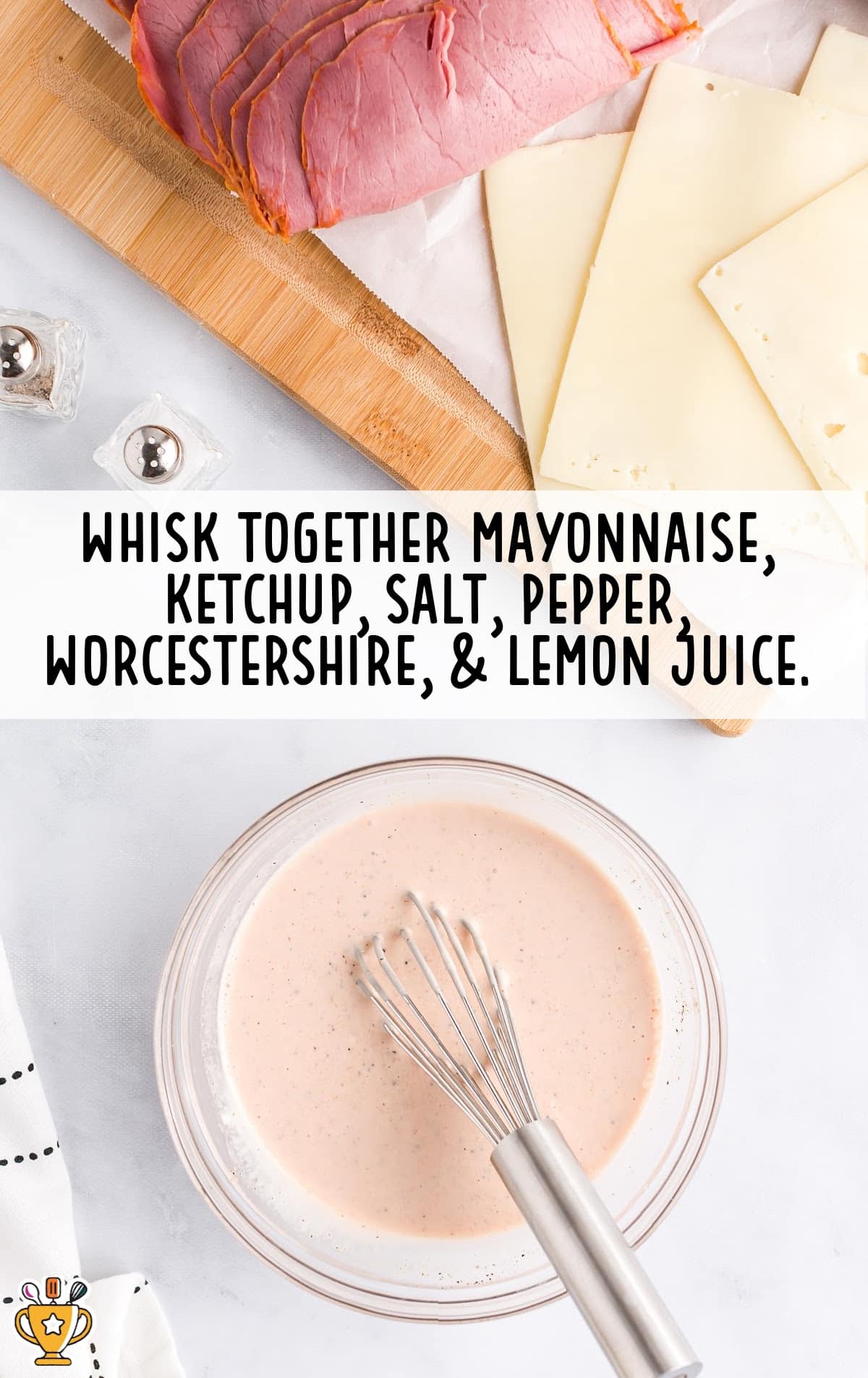 whisking together mayonnaise, ketchup, salt, pepper, worcestershire and lemon juice mixed together in a bowl