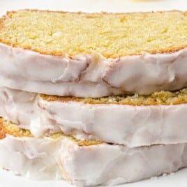 three slices of Starbucks Lemon Loaf on a white plate