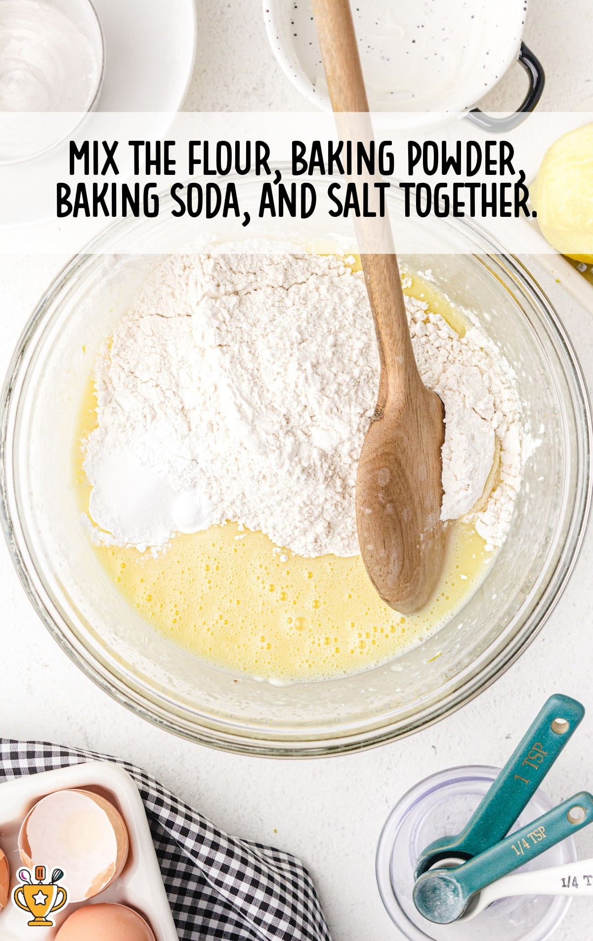 mixing the flour, baking powder, baking soda and salt in a bowl