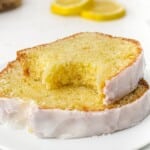 two slices of Starbucks Lemon Loaf on a plate, one with a bite on it