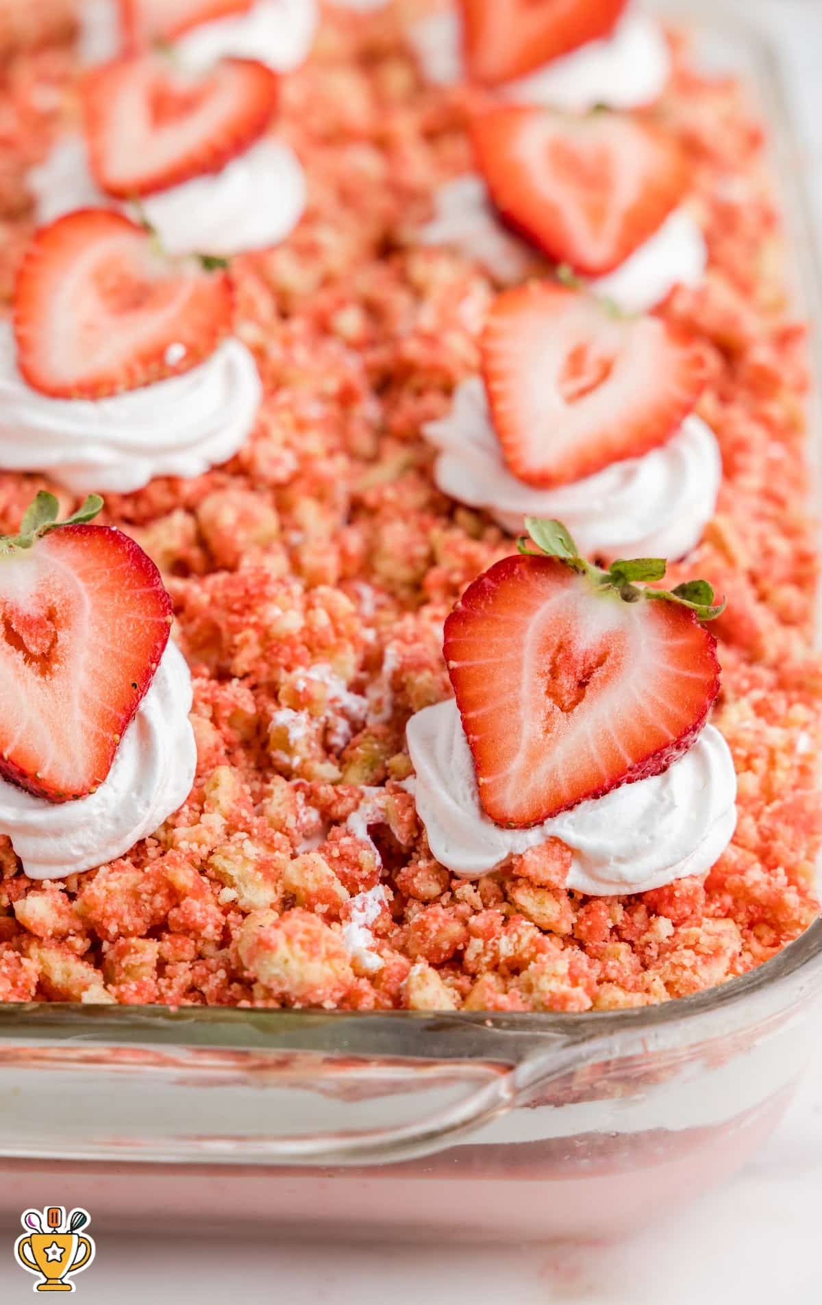 Strawberry Crunch Poke Cake in a baking dish