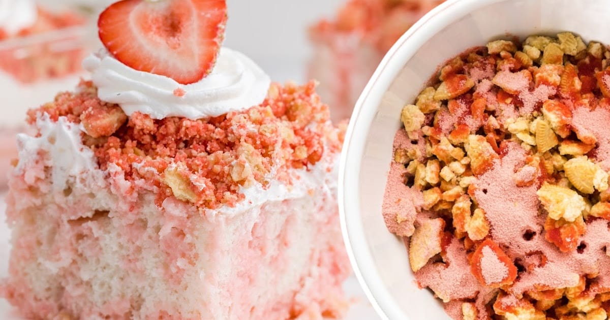 a piece of Strawberry Crunch Poke Cake
