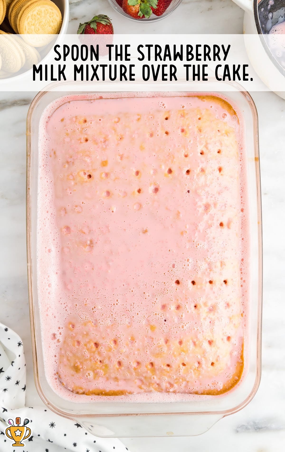 strawberry milk mixture over the cake